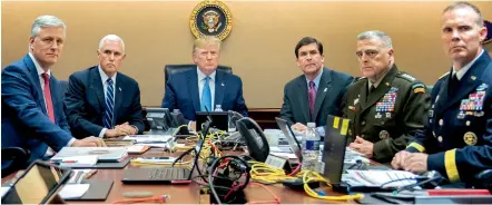  ?? — AP ?? In this photo, President Donald Trump is joined by his team in the Situation Room of the White House in Washington.