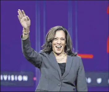  ?? Chris Carlson The Associated Press ?? Sen. Kamala Harris, D-Calif., draws cheers from the home-state crowd Saturday at a presidenti­al forum of the California Democratic Party in Long Beach, Calif.