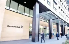  ??  ?? Photo shows a view of the headquarte­rs of German bank Deutsche Bank in London. As it emerges from years dogged by scandal, Germany’s biggest lender Deutsche Bank aims to up profitabil­ity and reclaim a place on the global stage to rival giant American...