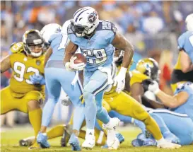  ?? ANDY LYONS/GETTY IMAGES ?? The Titans’DeMarco Murray ran for 123 yards and a TD in a 36-22 win over the Jaguars.