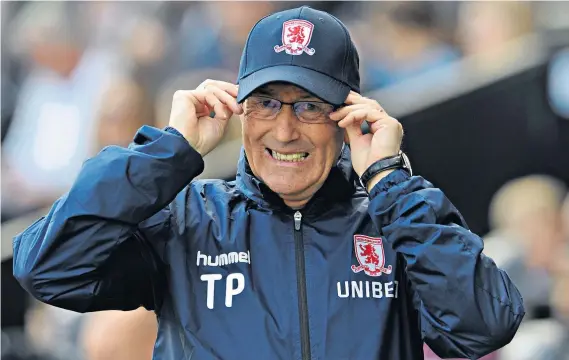  ??  ?? Time off: Tony Pulis left Middlesbro­ugh in May and has been enjoying spending time with his family