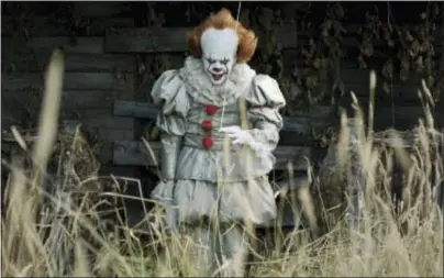  ??  ?? This image released by Warner Bros. Pictures shows Bill Skarsgard in a scene from “It.”