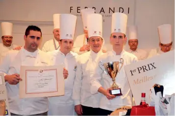  ??  ?? Above: Overall winner Gwendal Briant with the Master Chefs of France