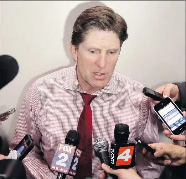  ?? — THE CANADIAN PRESS FILES ?? Detroit Red Wings head coach Mike Babcock has reportedly received a big-money offer from the Buffalo Sabres.