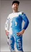  ?? Associated Press ?? Travis Ganong wears the new race suit to be worn at the world championsh­ips in France.