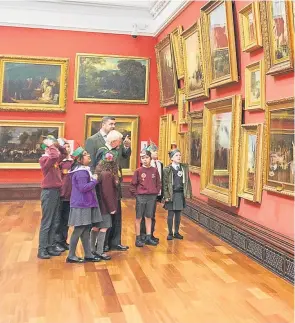  ??  ?? Visitors admire some of Dundee’s artwork at The McManus