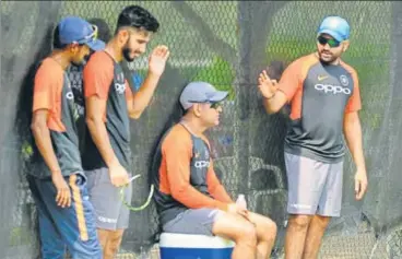  ?? PTI ?? India standin skipper Rohit Sharma, seen here with excaptain MS Dhoni, was not part of the Test side that lost the series to England.