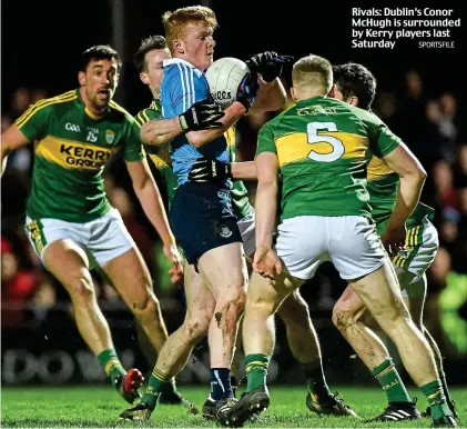  ?? SPORTSFILE ?? Rivals: Dublin’s Conor McHugh is surrounded by Kerry players last Saturday