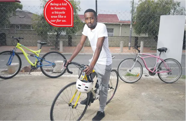  ?? Picture: Refilwe Modise ?? HITTING THE ROAD. Book Ibhoni bicycle tour company founder Mpumelelo Mtintso in Soweto. Being a kid in Soweto, a bicycle was like a car for us.