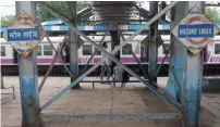  ?? AFP ?? A local train departs from the suburban Marine Lines railway station in Mumbai on Friday. —