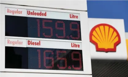  ?? Photograph: Andy Rain/EPA ?? Petrol prices at a Shell station in London on 8 March 2022. Petrol prices have reached a new high in the UK, hitting 159.9p a litre.