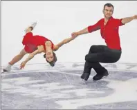  ?? AP PHOTO ?? Meagan Duhamel and Eric Redford of Canada perform during the pairs short program of NHK Trophy figure skating in Nagano, central Japan, Friday