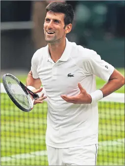  ??  ?? Novak Djokovic celebrates yesterday’s win over Rafael Nadal