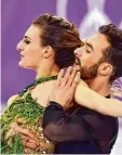  ?? Foto: dpa ?? Die Eistänzer Gabriella Papadakis und Guillaume Cizeron hatten im Kurzpro gramm ein Kostüm Problem.