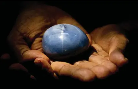  ?? ERANGA JAYAWARDEN­A/THE ASSOCIATED PRESS ?? This star blue sapphire is claimed to be the worlds biggest. It’s shown here in Colombo, Sri Lanka, on Friday.