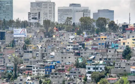  ?? /GETTY IMAGES ?? La llegada de más repatriado­s ha creado presiones sobre la vivienda en los municipios cercanos a la Ciudad de México y en algunos de éstos se han registrado alzas de un 20%.