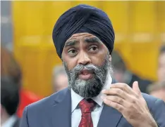  ?? SEAN KILPATRICK/THE CANADIAN PRESS ?? Defence Minister Harjit Sajjan responds to a question in the House of Commons in Ottawa earlier this week. Sajjan announced on Thursday tax breaks for all military personnel deployed on major operations abroad.