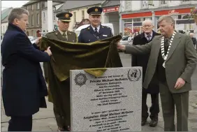  ??  ?? Cllr Edward Timmins and Cllr Tommy Cullen unveiling the monument.