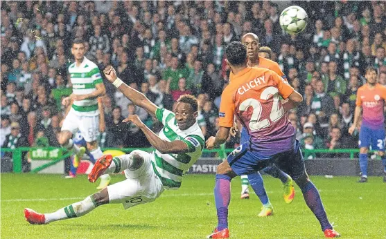  ?? SNS. ?? Moussa Dembele gives Brendan Rodgers side the lead for the third time against Manchester City with his second goal of the game.
