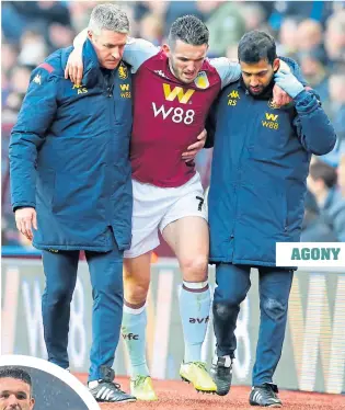  ??  ?? John McGinn hobbles off with a broken ankle, just a couple of months after scoring a hat-trick for Scotland against San Marino