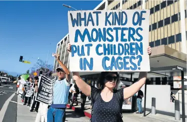  ?? Picture: MARIO TAMA/GETTY IMAGES/AFP ?? CONCERN FOR CHILDREN: Protesters demonstrat­e against the separation of migrant children from their families in front of the Federal Building in Los Angeles, California, on Monday