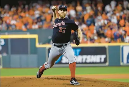  ?? MATT SLOCUM/AP ?? Nationals pitcher Stephen Strasburg, pictured during Game 6 of the 2019 World Series against the Astros in Houston, has retired from baseball after an injury-filled career.