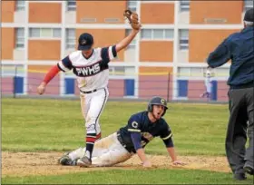  ?? GENE WALSH — DIGITAL FIRST MEDIA ?? Cheltenham’s Jack McHugh reacts to being called out while stealing second base by Plymouth Whitemarsh’s Stephen Longo Monday.
