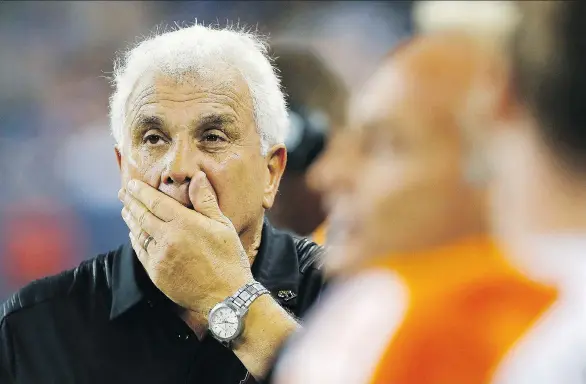  ?? JOHN WOODS/THE CANADIAN PRESS ?? B.C. Lions head coach Wally Buono seems to be in disbelief about what he is seeing during Saturday’s game against the Blue Bombers in Winnipeg.