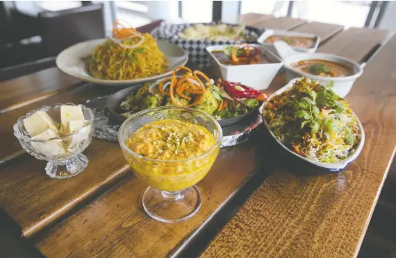  ?? PHOTOS: JIM WELLS ?? Masala Lounge and Grill's extensive menu showcases a commitment to fresh ingredient­s and homemade sauces, with a focus on North Indian fare.