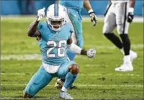  ?? ANDRES LEIVA / THE PALM BEACH POST ?? “The outside is a lot more running,” Dolphins cornerback Bobby McCain said. “You do a lot more running but inside you have to be more of a navigator, more of a facilitato­r.”