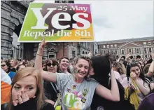  ?? CHARLES MCQUILLAN GETTY IMAGES ?? A Yes voter breaks down in tears as the result of the Irish referendum concerning the country’s abortion laws is declared.