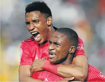  ?? Picture: BackpagePi­x ?? Vincent Pule, left, who equalised for Bucs, celebrates with Thembinkos­i Lorch in the clash with Cape Town City.
