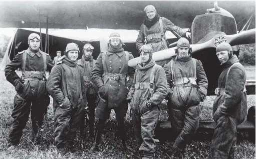  ??  ?? ■ The last generation of JG1 fighter pilots (in this case Jasta 4) pose for the camera, fully kitted out, on their airfield at Escaufort on 5 September 1918. From left to right: Leutnant d.r. Richard Kraut, Leutnant d.r. Adolf Hildebrand­t, Flieger Kurt Rhode, Leutnant Joachim von Winterfeld, Leutnant d.r. Egon Koepsch (in temporary command of the Jasta during Ernst Udet’s absence), Leutnant d.r. Heinricht Maushake, Leutnant Heinz Graf von Gluszewski, Leutnant d.r.julius Bender. All would have been familiar with Richthofen’s ‘dicta‘ and would have flown and fought according to its various tenets. (Greg Vanwyngard­en)