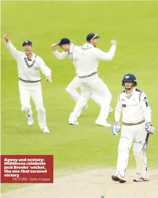  ?? PICTURE: Getty Images ?? Agony and ecstasy: Middlesex celebrate Jack Brooks’ wicket, the one that secured victory