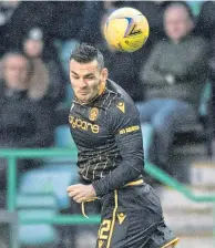  ?? ?? Tony Watt fires a powerful header goalwards