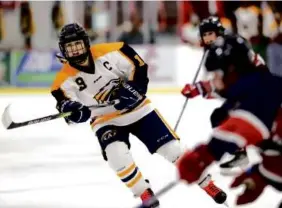  ?? JONATHAN WIGGS/GLOBE STAFF ?? After managing her diabetes protocol, Andover girls’ hockey captain Rose Memmolo has thrived on the ice.