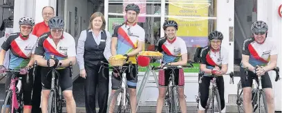  ??  ?? ‘Leek United’s branch manager Veronica McNeil (fourth from left) welcomes the relay team to the town. From left are: Gemma Callear, Simon Round, Peter Excell, Will Roberts, Louise Poole, Jo Cordall and Kevin Wilson.