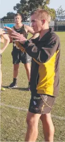  ?? Picture: DAVID ?? Grovedale coach and schoolteac­her Craig McCaughan instructin­g his players at training.