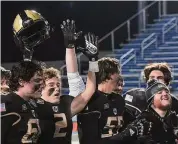  ?? ?? Joel Barlow football celebrates after defeating Valley Regional/Old Lyme for the CIAC Class SS championsh­ip at Arute Field in New Britain on Dec. 10.