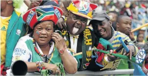  ?? / JAMES OATWAY. ?? Gladys and fellow fans watching Bafana Bafana play Poland at the Orlando Stadium, Soweto, on June 6 2009.