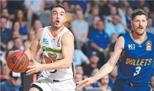  ?? Picture: AAP ?? IN FORM: Mirko Djeric (left) has been a revelation since his elevation to the Taipans starting unit in the middle of the season.