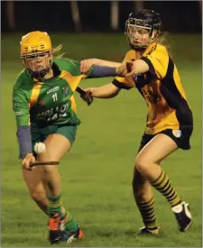  ??  ?? Aoife Doyle of Marshalsto­wn tries to hold off Larah Campbell (St. Ibar’s/Shelmalier) in the Junior league final in Craanford on Friday.