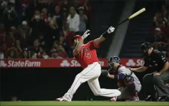  ?? ROBERT GAUTHIER, LOS ANGELES TIMES ?? Los Angeles Angels superstar slugger Albert Pujols hits a grand slam for his 600th career home run against the Minnesota Twins on Saturday, joining some of Major League Baseball’s elite in reaching that level.