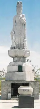  ??  ?? The 10-foot high Buddha statue in the Japanese Garden of Corregidor is thought to be an idol of fertility.