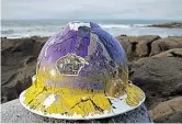  ??  ?? Transatlan­tic trip: The hat on Fanore Beach and, right, with its owner, Mr Bonnette in New Orleans in 2015