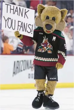  ?? GETTY ?? Arizona mascot ‘Howler’ thanks fans following final home game for Coyotes, who skate away to Salt Lake City after 28 years in desert.