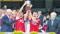  ?? (Pic: Denis O’Flynn) ?? Joint captains with Cork U17’s in 2017, Eoin and Brian Roche, lift the All-Ireland Cup following victory over Dublin.