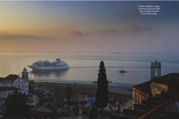  ??  ?? On her maiden voyage, Seabourn Ovation sails into a Lisbon sunrise for the first time.
