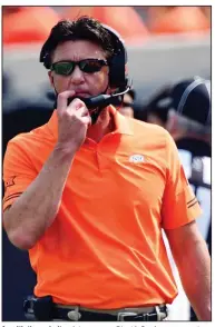  ?? (AP file photo) ?? As with the majority of the current Big 12 Conference coaches, Oklahoma State’s Mike Gundy said he’s pleased with the league’s expansion with Brigham Young, Central Florida, Cincinnati and Houston set to join the conference.