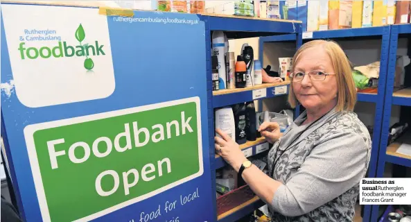  ??  ?? Business as usualRuthe­rglen foodbank manager Frances Grant